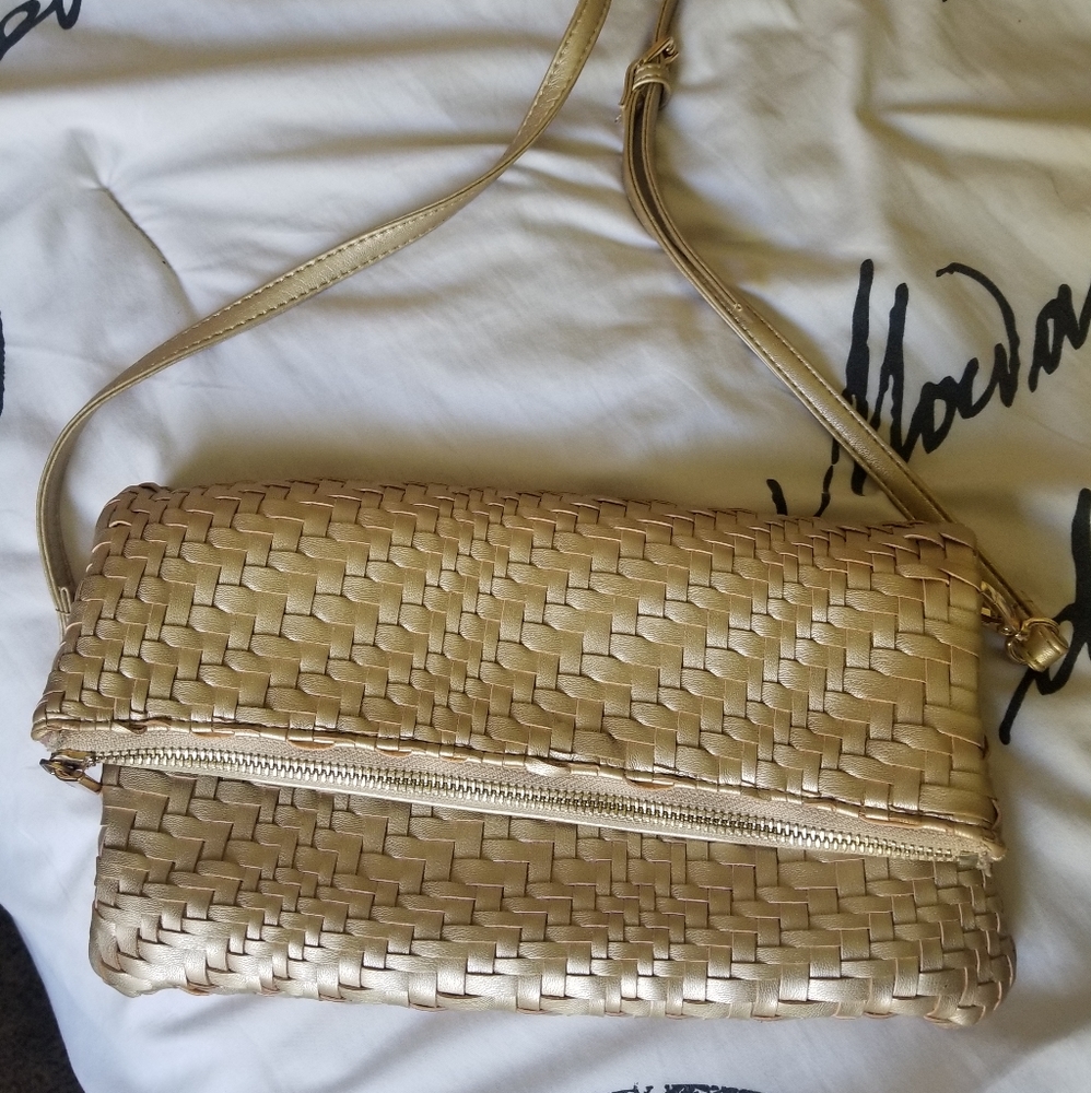 Gold Anthropologie crossbody bag